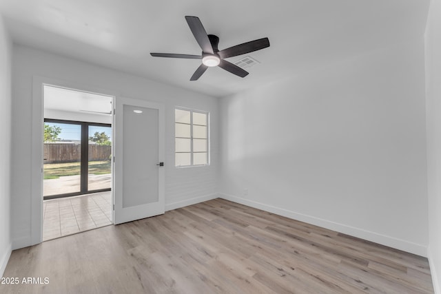 2425 E Harvard St, Phoenix, AZ 85008 - foyer featuring baseboards, a ceiling fan, wood finished floors, and visible vents