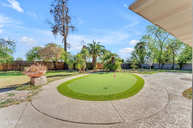 2425 E Harvard St, Phoenix, AZ 85008 - view of property's community featuring a patio area and a fenced backyard