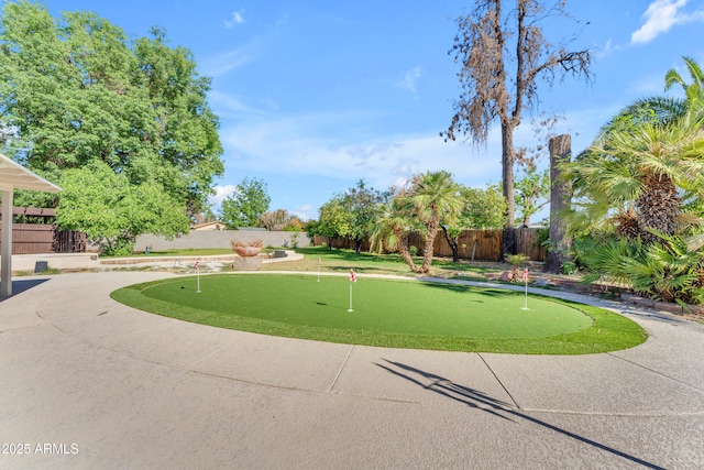 2425 E Harvard St, Phoenix, AZ 85008 - view of property's community with a fenced backyard and a patio