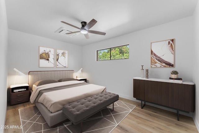 2425 E Harvard St, Phoenix, AZ 85008 - bedroom featuring ceiling fan, baseboards, and light wood-type flooring