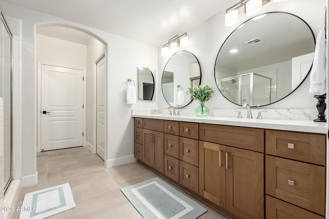 955 E Knox Rd Unit 126, Chandler, AZ 85225 - full bath with an enclosed shower, double vanity, and tile patterned flooring