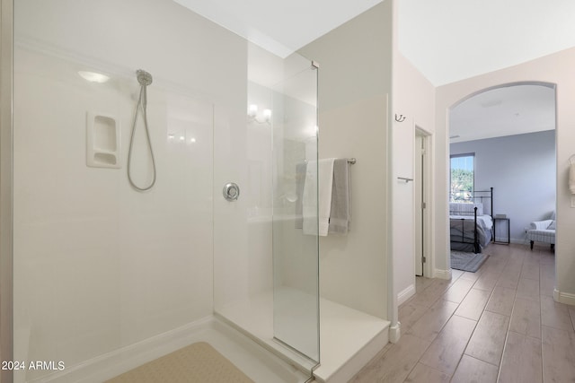 bathroom featuring tiled shower