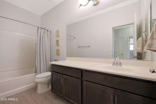 full bathroom with toilet, shower / bath combo with shower curtain, vanity, and wood-type flooring