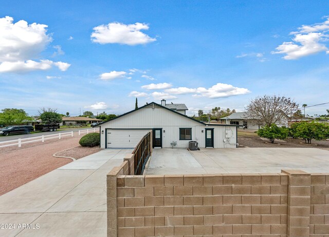 394 E Redfield Rd, Chandler, AZ 85225 - view of front of home featuring driveway and a garage