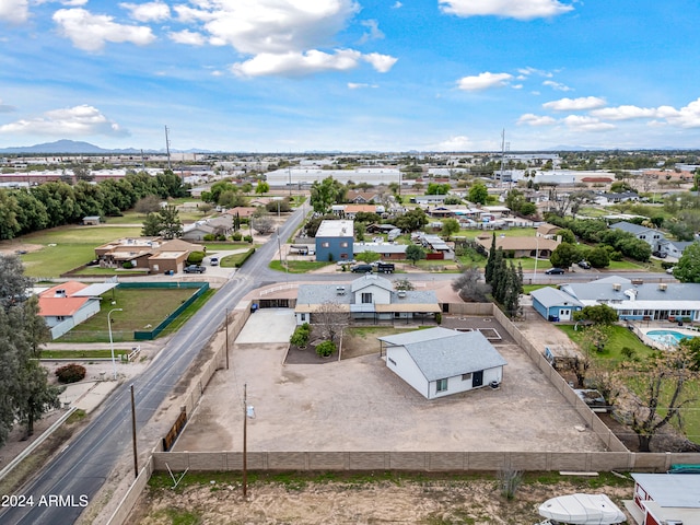 birds eye view of property featuring a mountain view