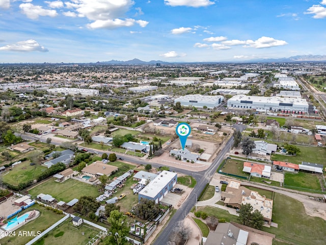 birds eye view of property featuring a mountain view