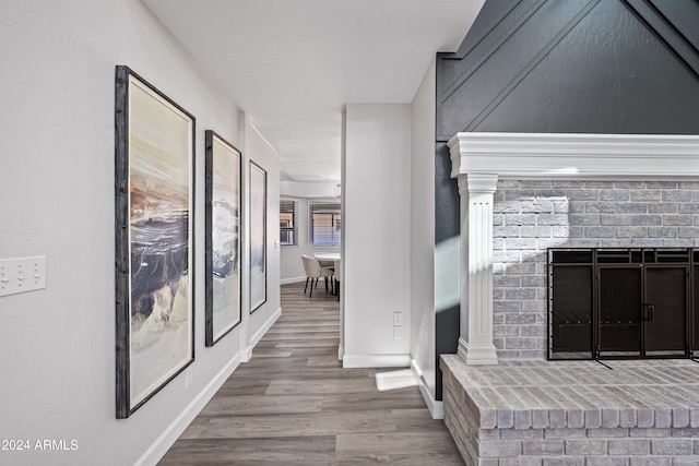 corridor featuring light hardwood / wood-style floors