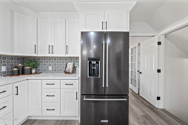 394 E Redfield Rd, Chandler, AZ 85225 - kitchen with high end fridge, light wood-style flooring, light countertops, and white cabinetry