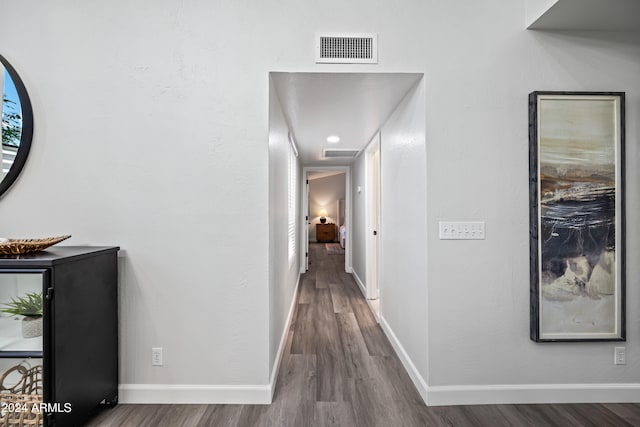 hallway featuring hardwood / wood-style floors