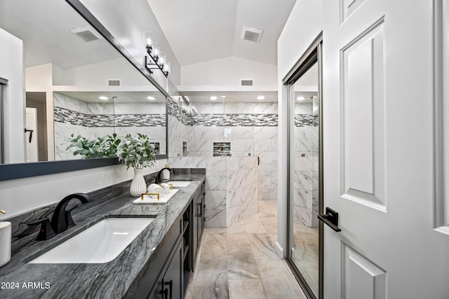 394 E Redfield Rd, Chandler, AZ 85225 - full bathroom featuring double vanity, marble look tile flooring, a walk in shower, and vaulted ceiling