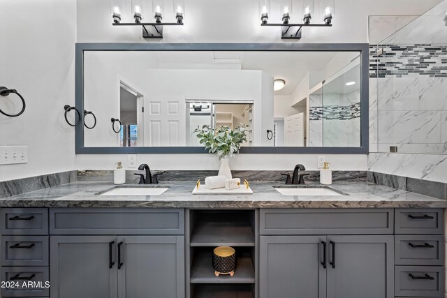 394 E Redfield Rd, Chandler, AZ 85225 - bathroom featuring double vanity and tiled shower