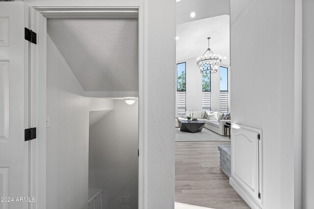 394 E Redfield Rd, Chandler, AZ 85225 - hall with light wood-type flooring, recessed lighting, and a chandelier