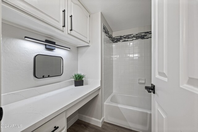 394 E Redfield Rd, Chandler, AZ 85225 - full bath with wood finished floors, bathing tub / shower combination, vanity, and baseboards