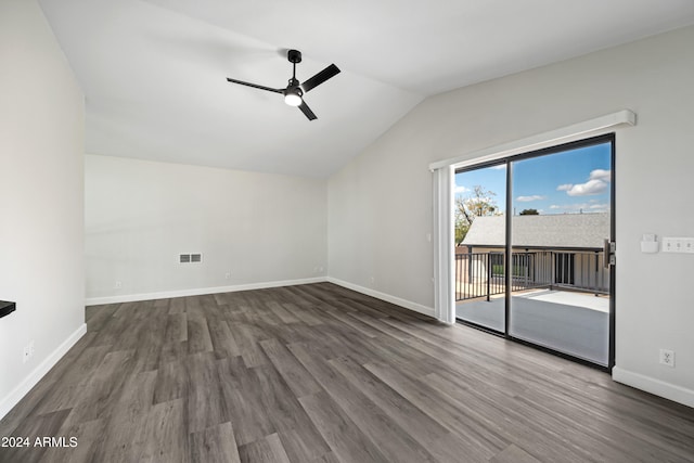 interior space with vaulted ceiling, ceiling fan, and dark wood-type flooring