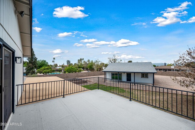 394 E Redfield Rd, Chandler, AZ 85225 - fenced backyard with an outdoor structure and a patio area