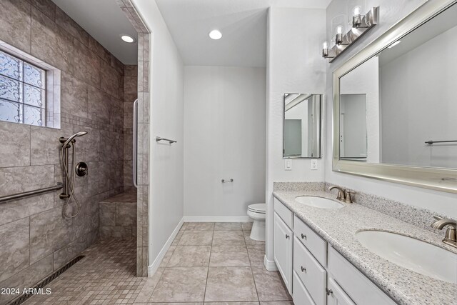 394 E Redfield Rd, Chandler, AZ 85225 - full bathroom with double vanity, a walk in shower, toilet, baseboards, and recessed lighting