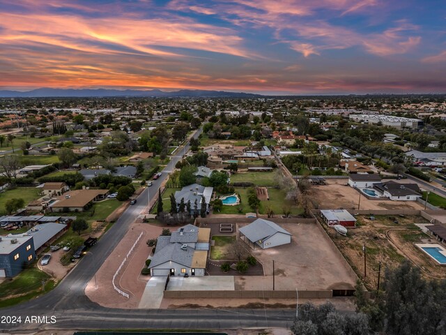 394 E Redfield Rd, Chandler, AZ 85225 - aerial view of property and surrounding area with a mountainous background and nearby suburban area