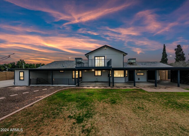 394 E Redfield Rd, Chandler, AZ 85225 - back of property at dusk with a patio