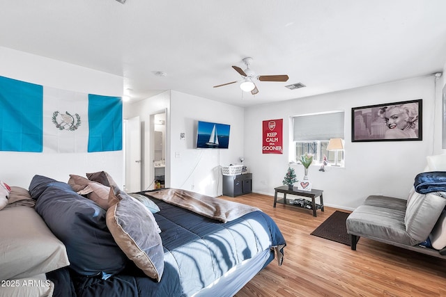 bedroom featuring wood-type flooring and ceiling fan