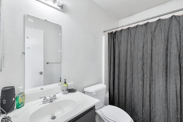 full bathroom with vanity, toilet, and shower / bathtub combination with curtain