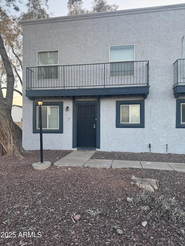 4142 N 11th St Unit 8, Phoenix, AZ 85014 - view of property with a balcony and stucco siding