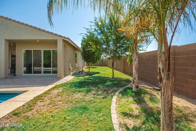 17966 W Highland Ave, Goodyear, AZ 85395 - view of yard featuring a patio area, a fenced backyard, and a fenced in pool
