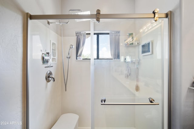 full bath featuring a stall shower