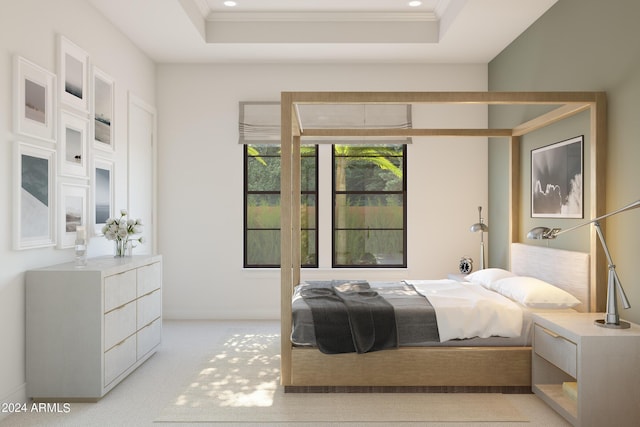 bedroom with a raised ceiling, crown molding, and light colored carpet