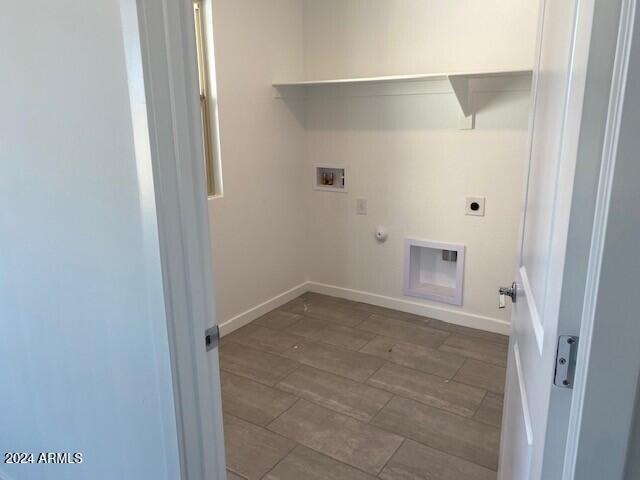 laundry room featuring hookup for an electric dryer, hookup for a gas dryer, and hookup for a washing machine