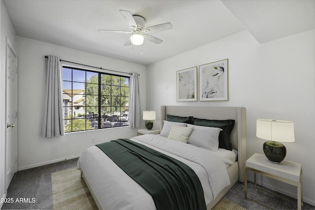 bedroom with carpet floors, a ceiling fan, and baseboards