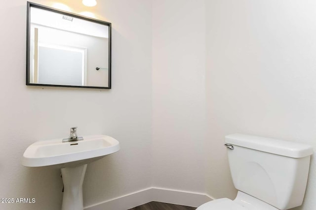 5329 E Harmony Ave, Mesa, AZ 85206 - bathroom featuring toilet and baseboards