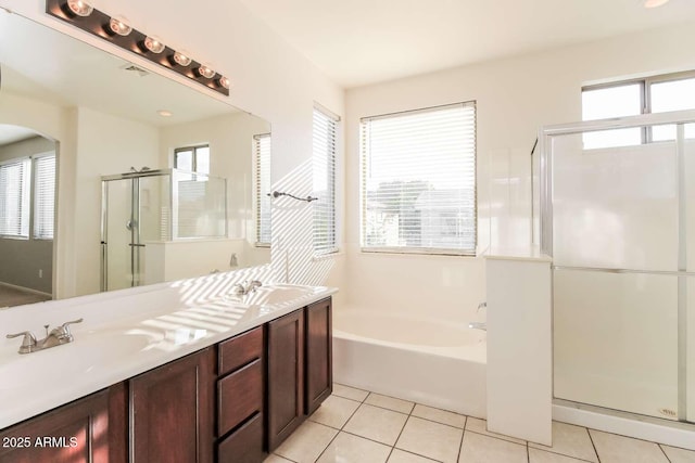 5329 E Harmony Ave, Mesa, AZ 85206 - full bathroom featuring a stall shower, a bath, tile patterned flooring, and double vanity