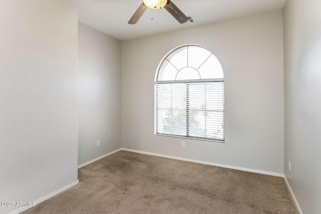 5329 E Harmony Ave, Mesa, AZ 85206 - carpeted spare room with healthy amount of natural light, a ceiling fan, and baseboards