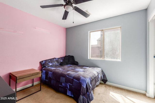 bedroom with carpet floors, visible vents, baseboards, and a ceiling fan