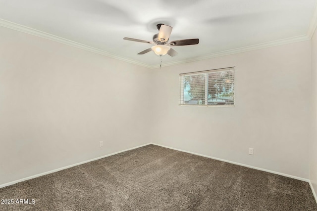 carpeted empty room with ceiling fan, baseboards, and ornamental molding