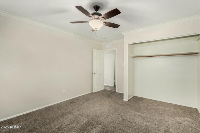 unfurnished bedroom with visible vents, a ceiling fan, carpet flooring, crown molding, and baseboards