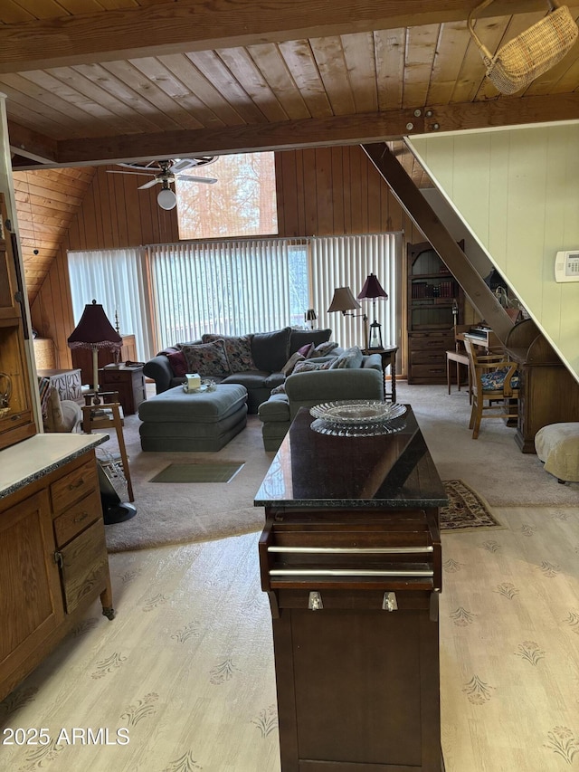 3994 N Mohawk St, Pine, AZ 85544 - living area with wood ceiling, light wood-type flooring, a ceiling fan, wood walls, and stairs