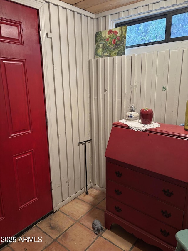 3994 N Mohawk St, Pine, AZ 85544 - bathroom with wooden walls and tile patterned floors