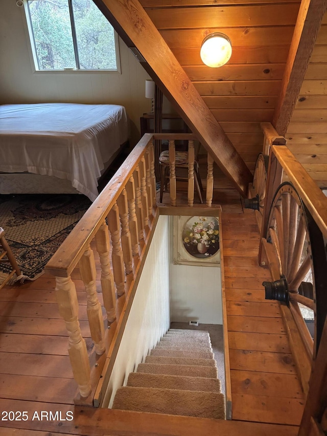 3994 N Mohawk St, Pine, AZ 85544 - stairs featuring wood walls and wood ceiling with exposed beams