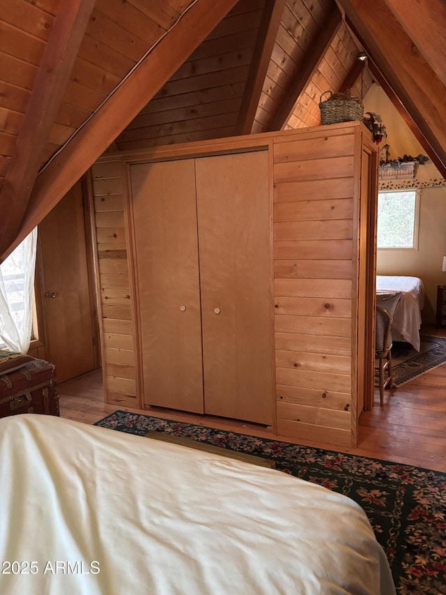 3994 N Mohawk St, Pine, AZ 85544 - bedroom with wood-type flooring, wooden ceiling, and wooden walls