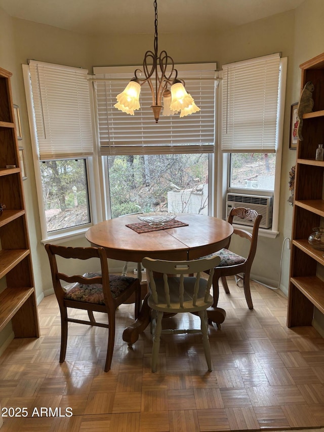 3994 N Mohawk St, Pine, AZ 85544 - dining area featuring a chandelier and cooling unit