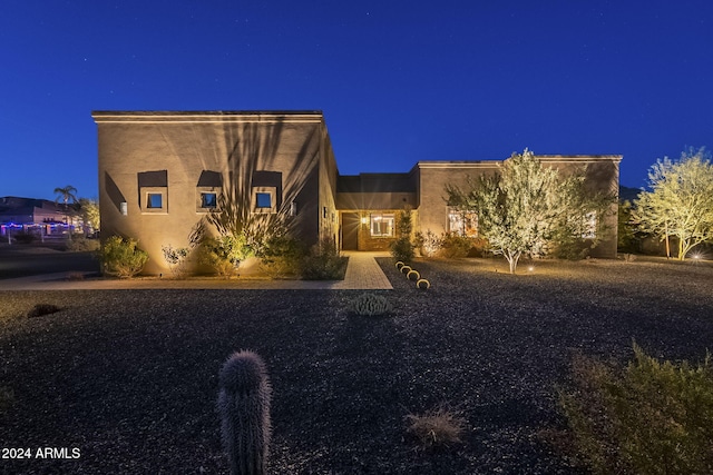 view of adobe home