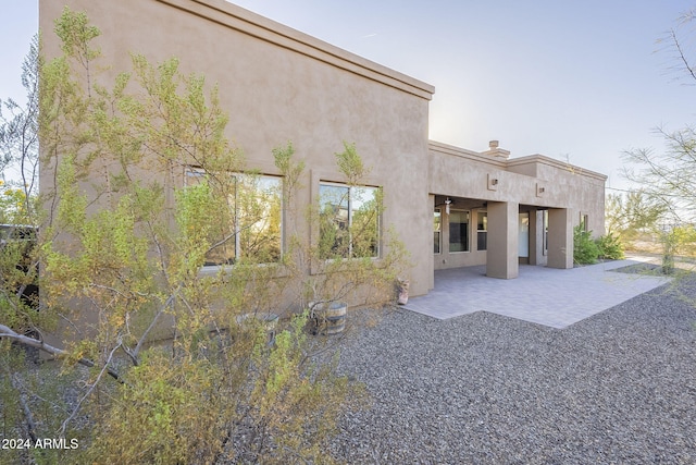 rear view of property with a patio area