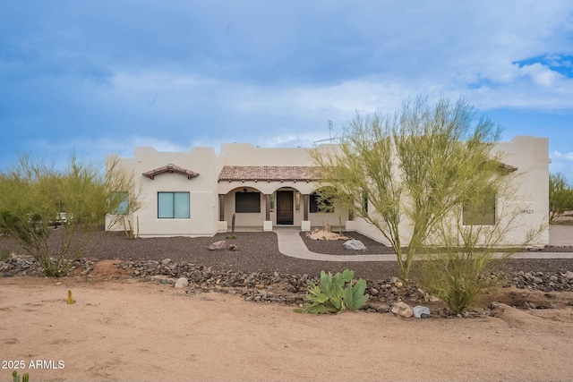 28423 N 139th St, Scottsdale, AZ 85262 - pueblo-style house with a tile roof and stucco siding