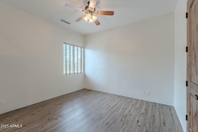 28423 N 139th St, Scottsdale, AZ 85262 - spare room with ceiling fan, visible vents, and wood finished floors