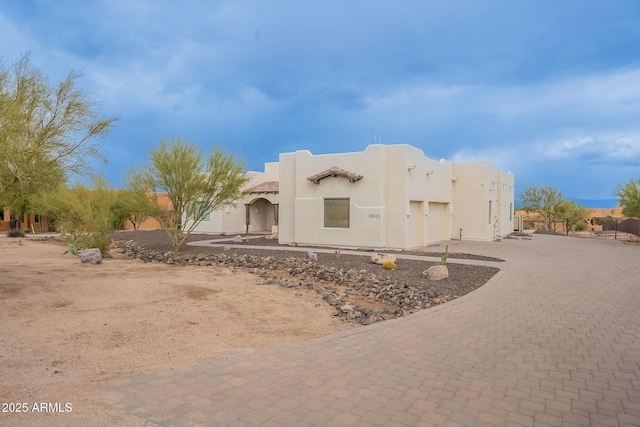28423 N 139th St, Scottsdale, AZ 85262 - view of front of house with driveway, an attached garage, and stucco siding