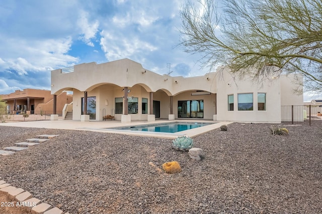 28423 N 139th St, Scottsdale, AZ 85262 - rear view of house with stucco siding, an outdoor pool, fence, and a patio area