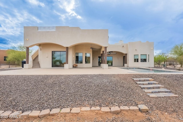 28423 N 139th St, Scottsdale, AZ 85262 - rear view of house featuring stairway, fence, stucco siding, a patio, and ceiling fan