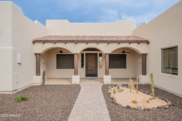 28423 N 139th St, Scottsdale, AZ 85262 - view of front of house featuring covered porch, a tiled roof, stucco siding, and ceiling fan