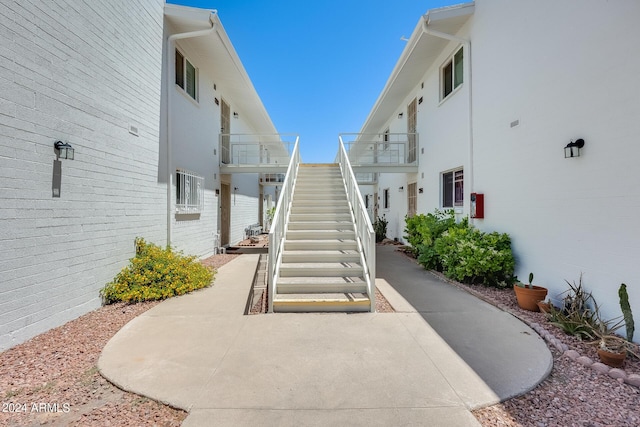 surrounding community featuring stairway